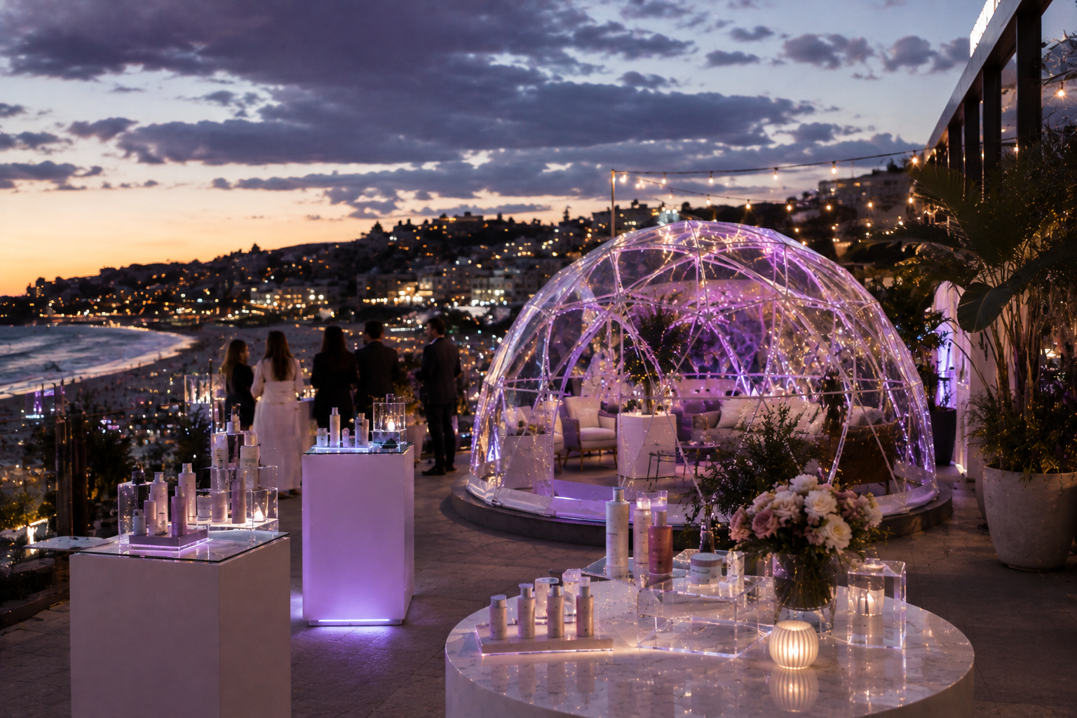 Product launch with clear dome and beauty displays at sunset