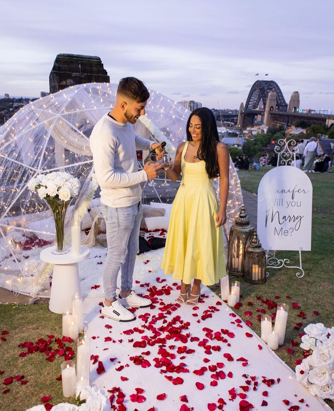 IGLOOZE proposal dome with fairy lights and rose petals overlooking the Sydney Harbour Bridge