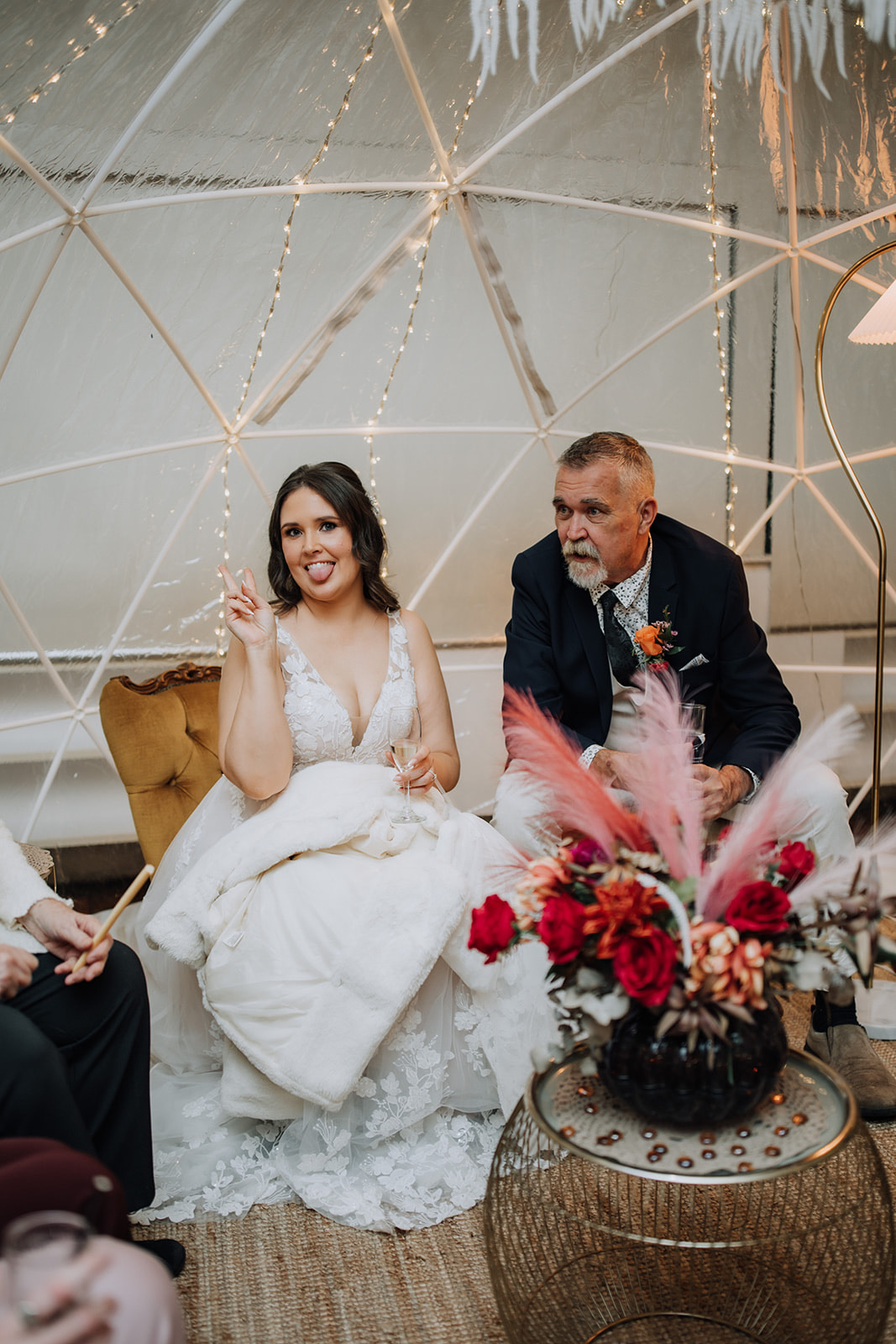 Bride celebrating inside a styled IGLOOZE dome