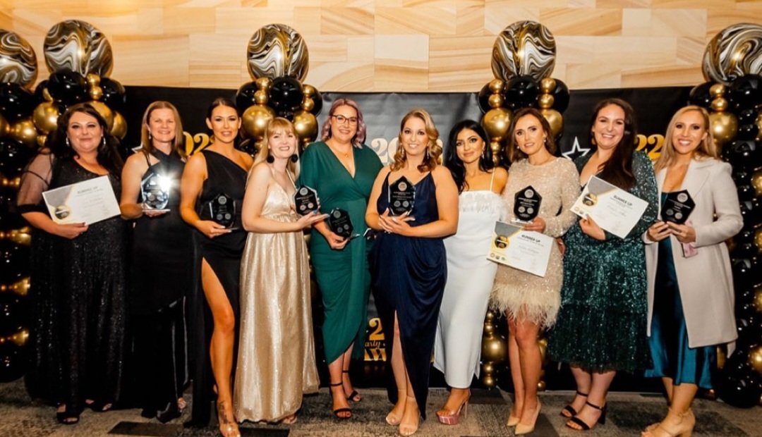 The IGLOOZE team photographed together at an awards ceremony